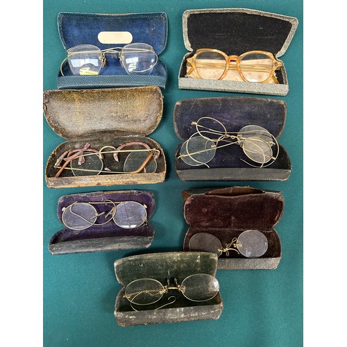 223 - 7 Pairs of vintage spectacles and pince nez with cases