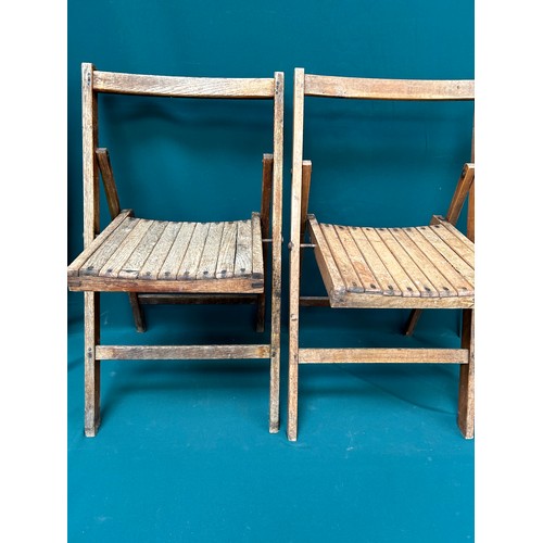 524 - Two WW2 era wooden folding chairs, one oak - war Department with George VI stamp, the other in beech