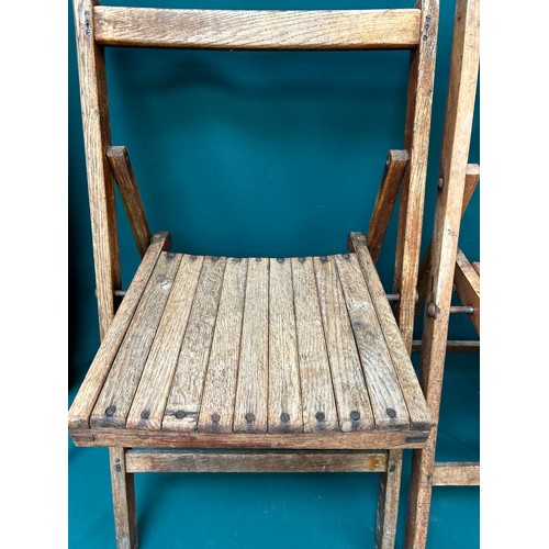 524 - Two WW2 era wooden folding chairs, one oak - war Department with George VI stamp, the other in beech