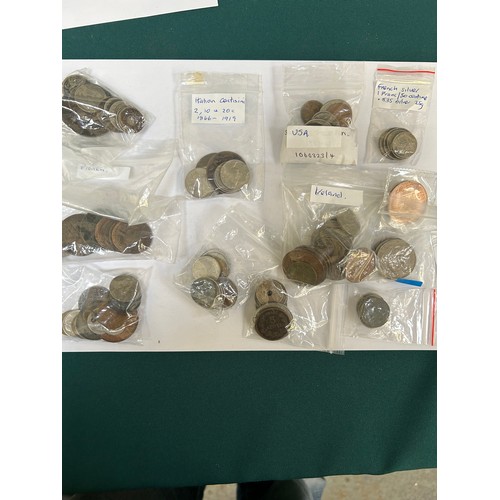 93 - Bag of Foreign coins including Jersey, Ireland, Italy, USA, Guernsey, French. Includes French .835 s... 