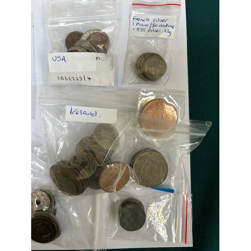 93 - Bag of Foreign coins including Jersey, Ireland, Italy, USA, Guernsey, French. Includes French .835 s... 