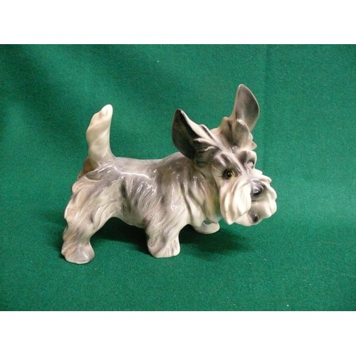 107 - A DANBURY MINT TRI-COLOUR CAVALIER KING CHARLES SPANIEL PLUS A CERAMIC SCOTTISH TERRIER