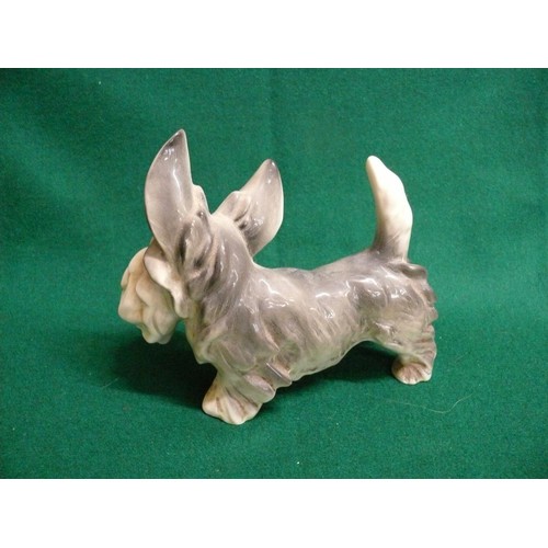 107 - A DANBURY MINT TRI-COLOUR CAVALIER KING CHARLES SPANIEL PLUS A CERAMIC SCOTTISH TERRIER