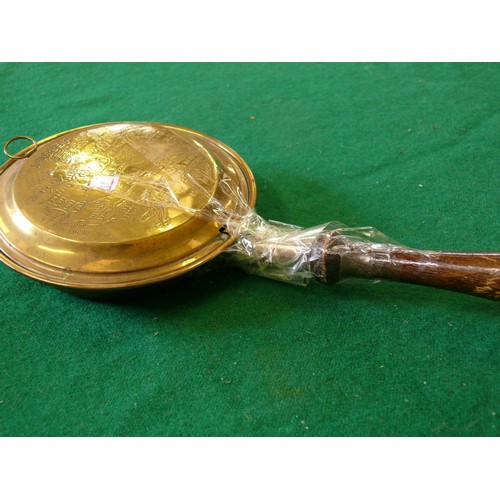 79B - SMALL BRASS BED WARMER WITH SLIGHT REPAIR. THE PROCEEDS OF THIS LOT WILL BE DONATED TO CHARITY