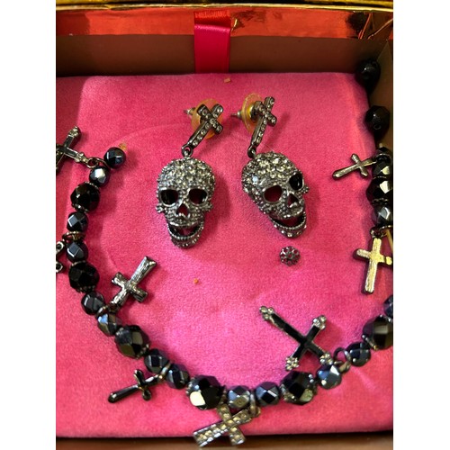 6 - BUTLER & WILSON DESIGNER JEWELLERY PAIR OF SKULL & CROSS EARRINGS AND A BLACK BEAD BRACELET WITH DIA... 