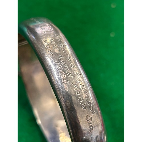 15 - STERLING SILVER BANGLE ENGRAVED WITH  FOLIATE DESIGN - HALLMARKED AND ENGRAVED 1960