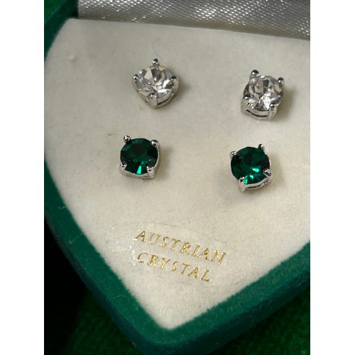 17 - THREE PAIRS OF AUSTRIAN CRYSTAL EARRINGS TWO WITH CLEAR CRYSTALS AND ONE PAIR EMERALD COLOUR. IN ORI... 