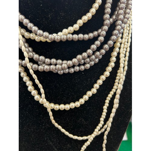 20 - SIX STRANDS OF SIMULATED PEARLS - DIFFERENT SIZES AND LENGTHS - CAN BE WORN INDIVIDUALLY OR TOGETHER