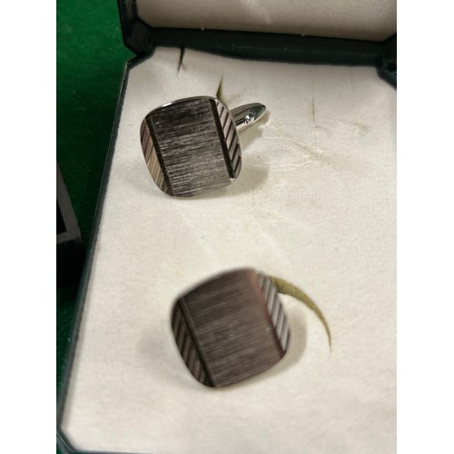 29 - TWO PAIRS OF GENTS BRUSHED STEEL AND CHROME CUFFLINKS WITH BOXES, ONE PAIR WITH INITIALS 