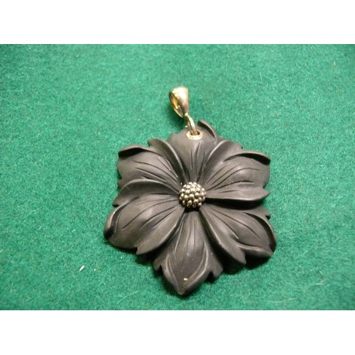 25 - AN UNUSUAL BLACK JASPER FLOWER PENDANT WITH STERLING SILVER LOOP  - 5CM DIA