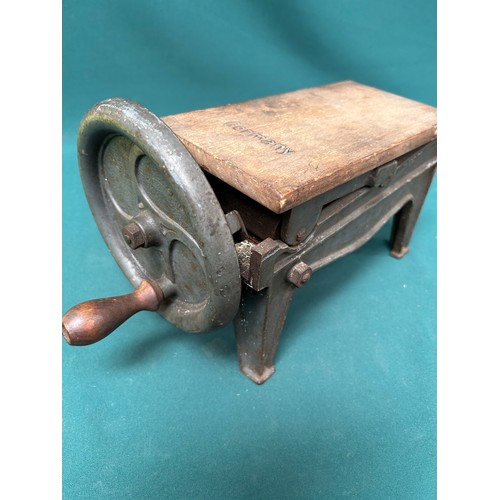 406 - An early 20th Century German made cast iron tobacco cutter or shredder