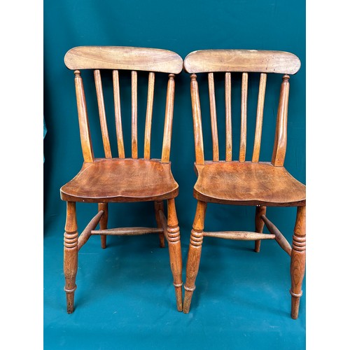 485 - Good pair of Victorian elm seated kitchen chairs with lathe backs - nice chestnut colour