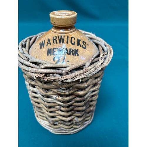 217A - Antique Stoneware Beer Flagon in original wicker carrier - Warwicks Newark