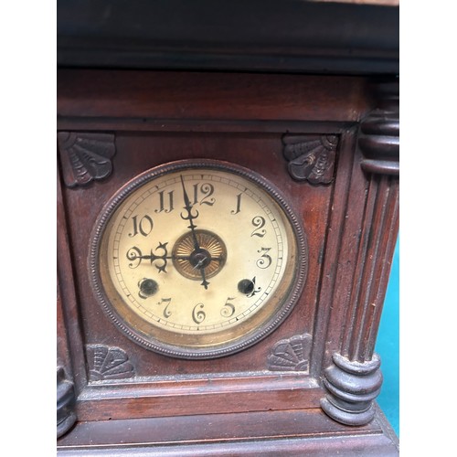 276 - A Victorian mahogany cased mantel clock - the enamel and gilt brass dial with arabic numerals - with... 