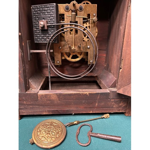 276 - A Victorian mahogany cased mantel clock - the enamel and gilt brass dial with arabic numerals - with... 