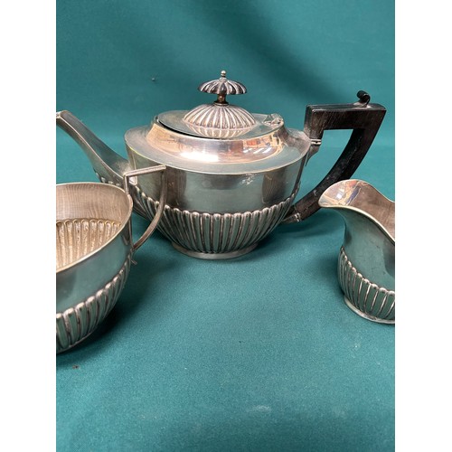 298 - A silver plated 3 piece tea service in the Georgian style and another 2 piece with teapot & sugar bo... 