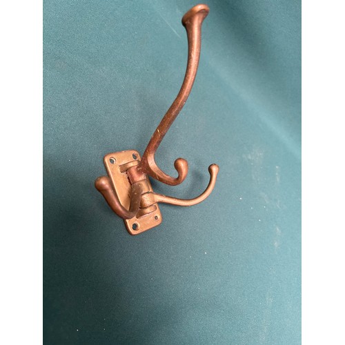 334 - Brass ware including door furniture - locks, letter box etc a hinged coat hook, brackets etc