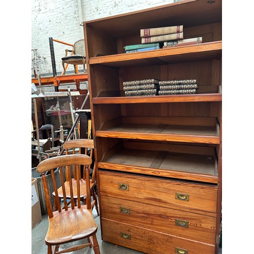 483 - Large Victorian pitch pine linen press cupboard with four sliding linen shelves and 3 drawers below ... 