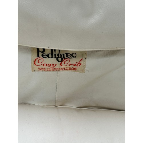 351 - A vintage blue quilt effect Carry Cot  by Pedigree - with label 