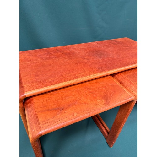 503 - A circa 1970's bentwood teak nest of 3 tables with label on larger piece 