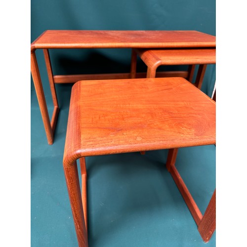 503 - A circa 1970's bentwood teak nest of 3 tables with label on larger piece 