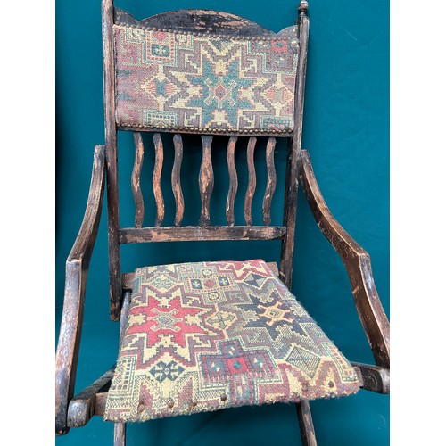 523 - A late Victorian Folding chair with tapestry type seat and back. Needs repair to bottom stretcher, s... 