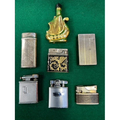 117G - Collection of 7 mid century lighters including a Gauloises Bondes, Colibri Molectric 88, Penguin Gas... 