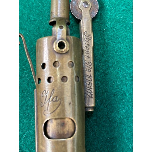 117B - A good 1920's Austrian IMCO Patent 105107 brass lighter and a later example of the same design