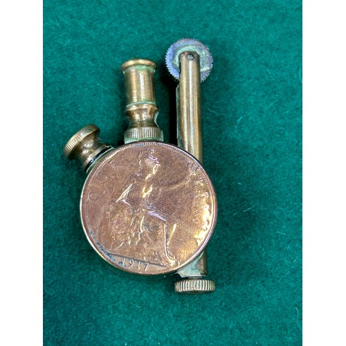 117A - An unusual WW1 trench art brass cigarette lighter with a 1917 Penny and a George V Farthing