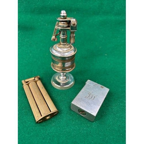 117E - A British made Anglia table lighter circa 1947 together with a Doric England lighter and another ear... 