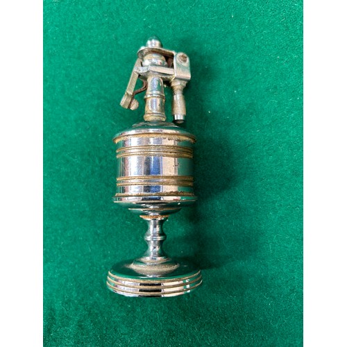 117E - A British made Anglia table lighter circa 1947 together with a Doric England lighter and another ear... 