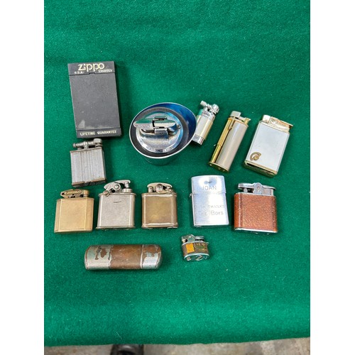 117H - Collection of 13 cigarette lighters including a modernist style Ronson table lighter, a Royal Musica... 