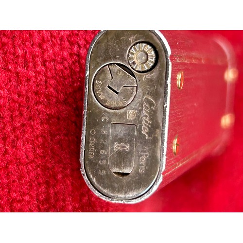 62B - A genuine palladium plated Santos de Cartier lighter serial number C 82655, brushed satin finish wit... 