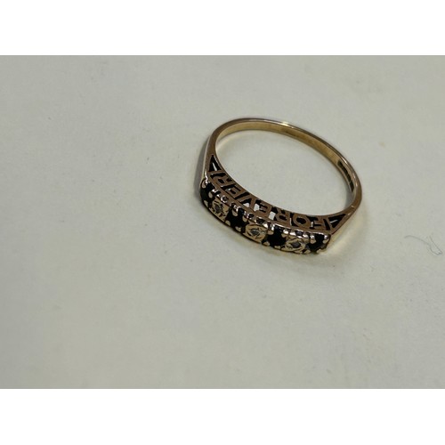 50D - 9ct Gold half eternity ring set with 3 diamonds and 4 sapphires raised on a pierced gallery spelling... 