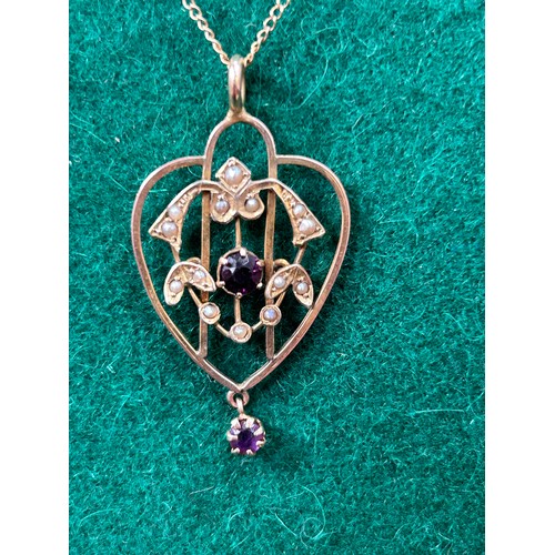 50A - An antique Art Nouveau style pendant with two amethysts and 14 seed pearls on a 9ct gold chain - 3.6... 