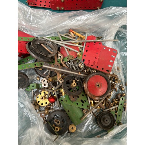 332 - Box of vintage Meccano including clockwork engine, motor, wheels tools etc