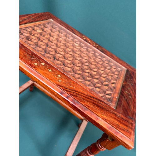 428 - Unusual nest of three tables in rosewood with brass leaf inlay, the tops pierced in a geometric desi... 