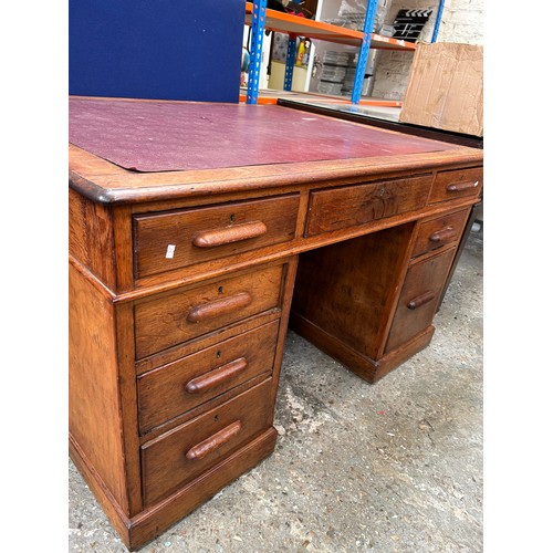 424 - Early 20th Century Oak twin pedestal partner’s desk. Very deep 43” front to back x 54” wide