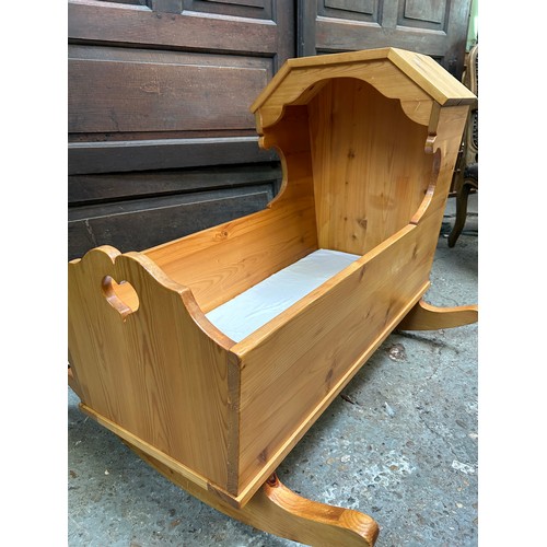 351B - A handmade traditional baby’s cradle in pine with rockers