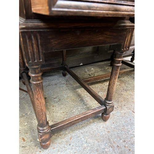 505 - 1920's oak desk with turned legs, 5 drawers and heavy brass drop handles