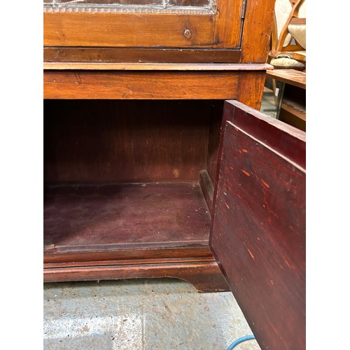 506 - Edwardian Mahogany bookcase cabinet with leaded glass doors - stencilled decoration to bottom doors.