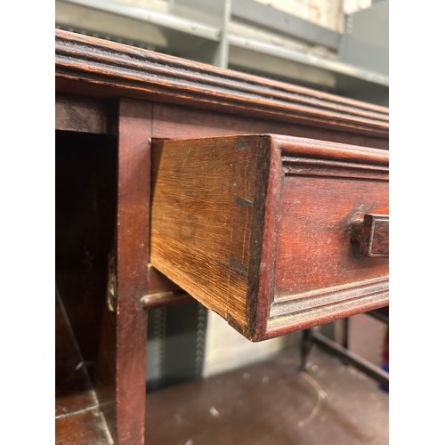 512 - Late Victorian Mahogany desk or side table with 3 drawers, carved panels on original brown pot casto... 