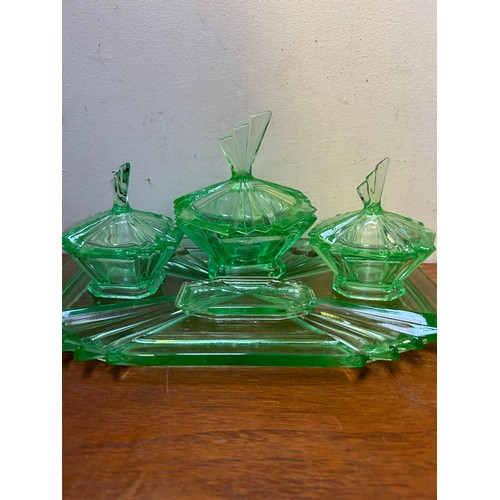 17 - A good Art Deco green uranium glass dressing table set consisting of 6 pieces - by Bagley & Co West ... 