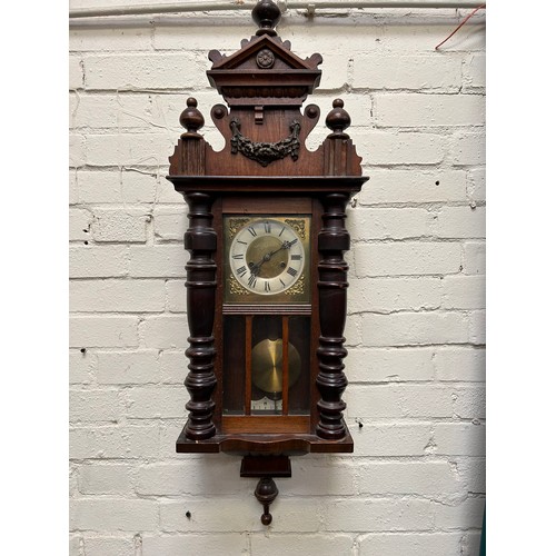 274 - 1920's Vienna style wall clock with pendulum & key