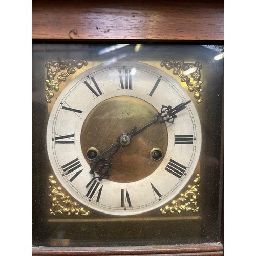 274 - 1920's Vienna style wall clock with pendulum & key