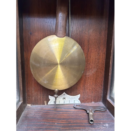 274 - 1920's Vienna style wall clock with pendulum & key