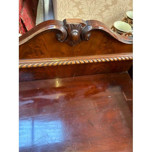 468 - A large 1920's Mahogany Sideboard with two central bow fronted drawers flanked by cupboards on cabri... 