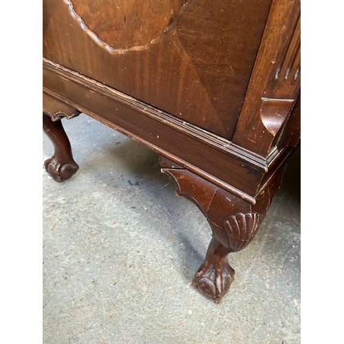 468 - A large 1920's Mahogany Sideboard with two central bow fronted drawers flanked by cupboards on cabri... 