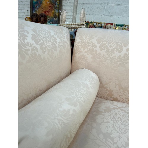 519 - A good quality Knole style two seater sofa - traditionally upholstered in stone coloured damask fabr... 