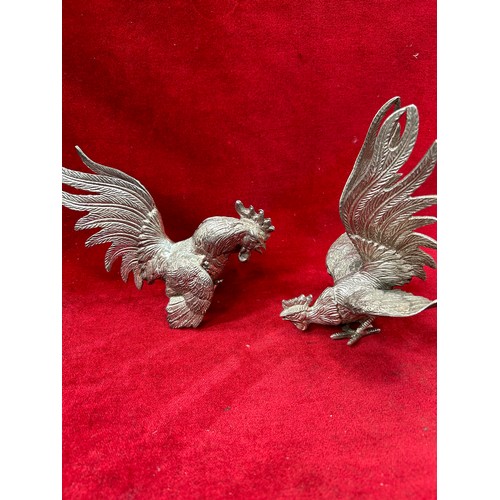 299A - A pair vintage of silver plated fighting cocks